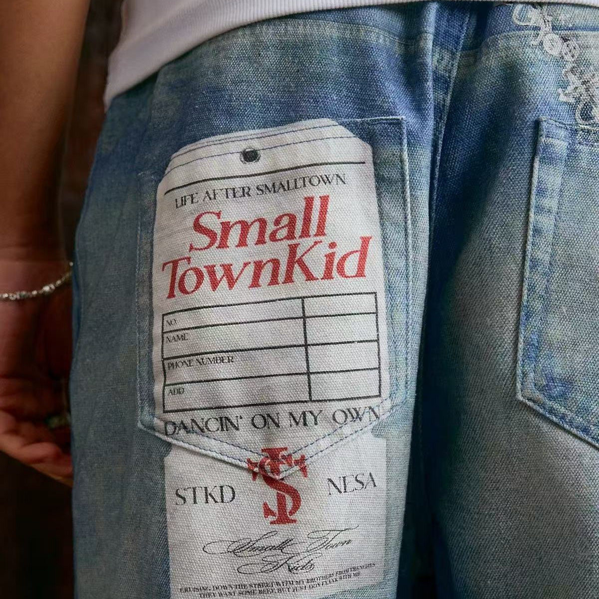 STK Vintage Distressed Wash 3D Badge Print Jeans