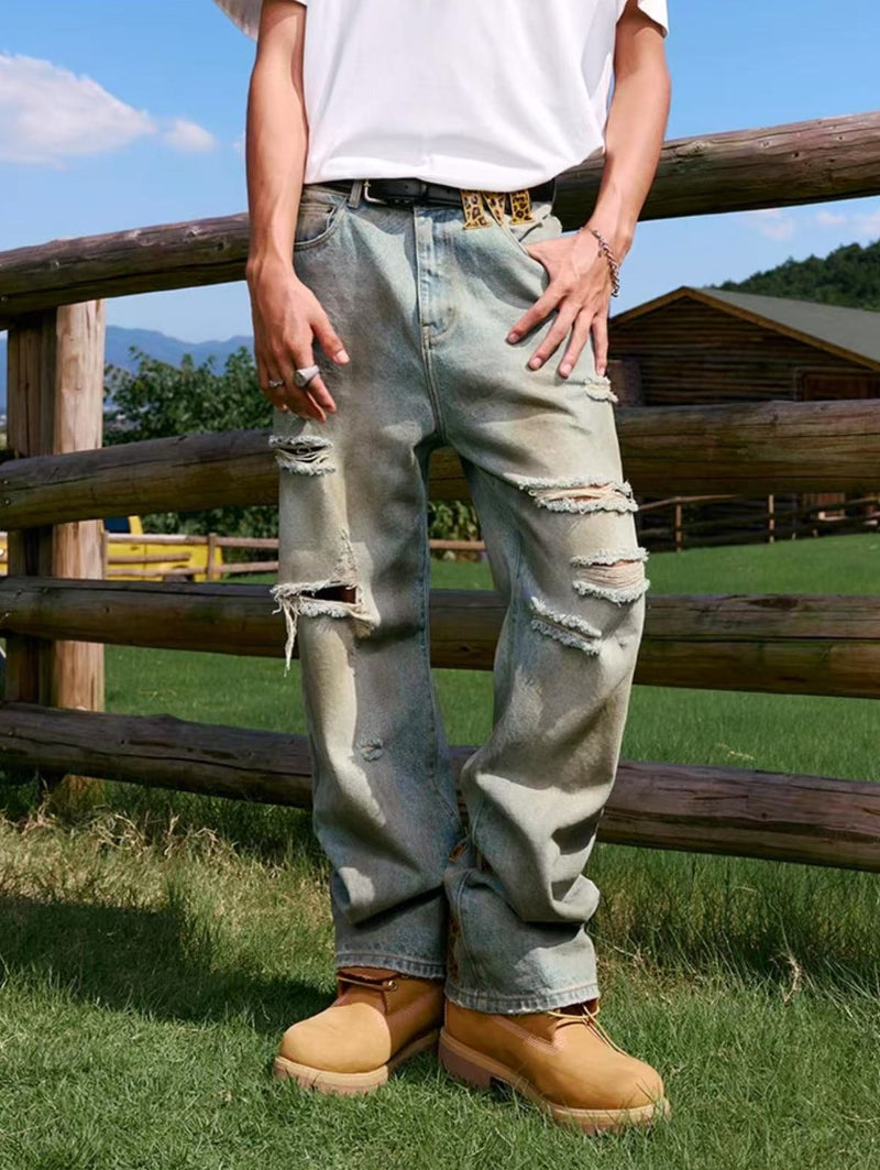 MEDM Large Letter Patch Leather Washed Ripped Jeans