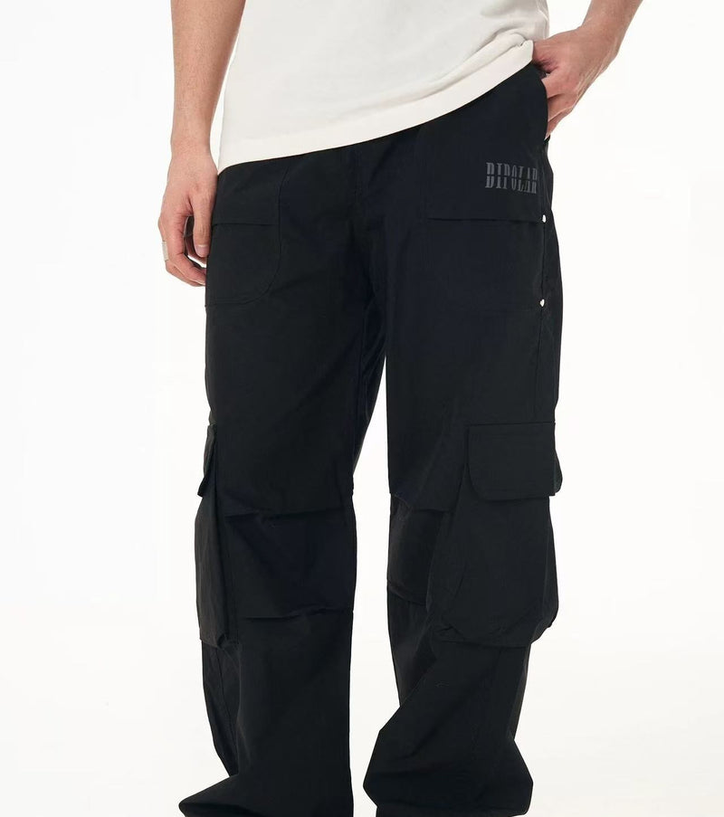 BIPOLAR Pleated Paratrooper Cargo Pants