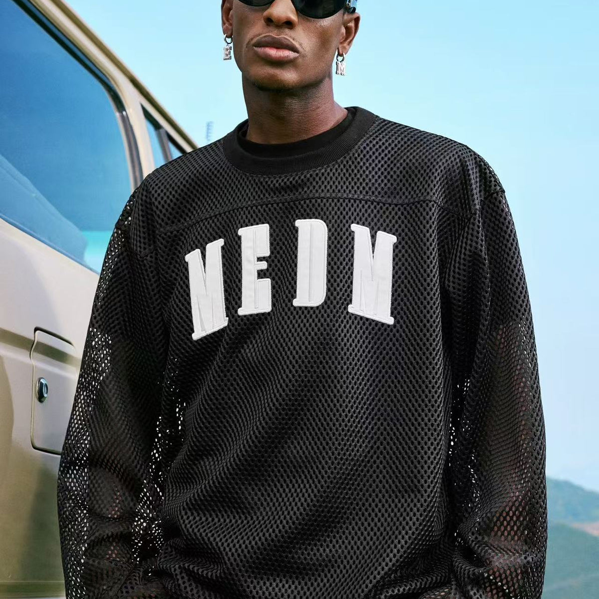 MEDM Logo Grid Hollow Design Long-sleeved T-shirt