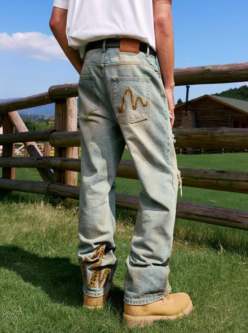 MEDM Large Letter Patch Leather Washed Ripped Jeans