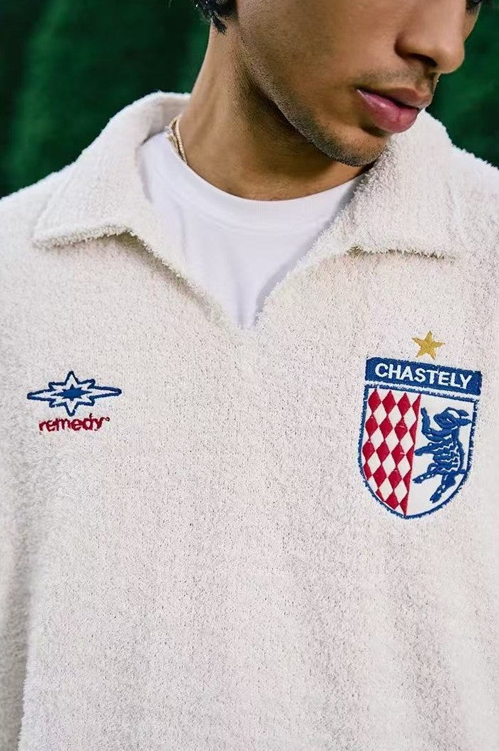 REMEDY Logo Embroidered Top