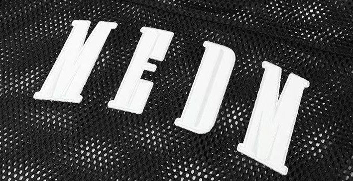 MEDM Logo Grid Hollow Design Long-sleeved T-shirt